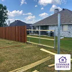 Fence being rebuilt in Krum, TX by Lynnmar Services.